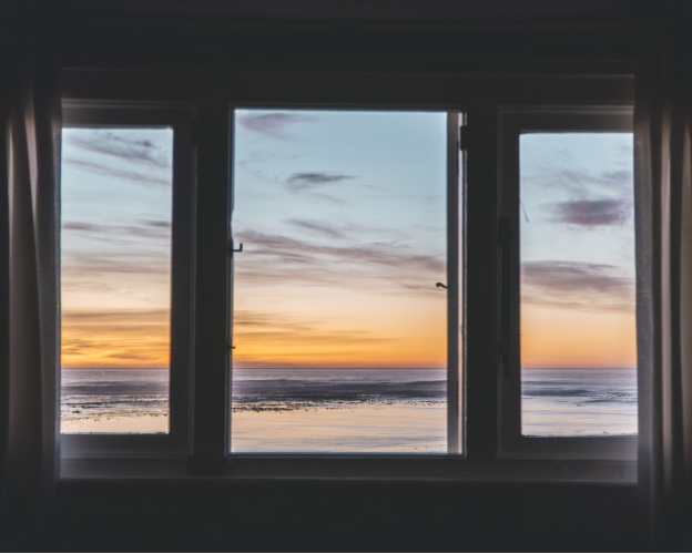 Glazed windows with a view of the sea